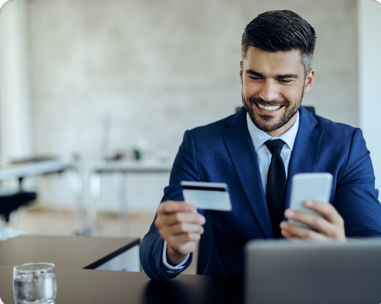 happy-entrepreneur-online-banking-with-credit-card-mobile-phone-office happy-entrepreneur-online-banking-with-credit-card-mobile-phone-office